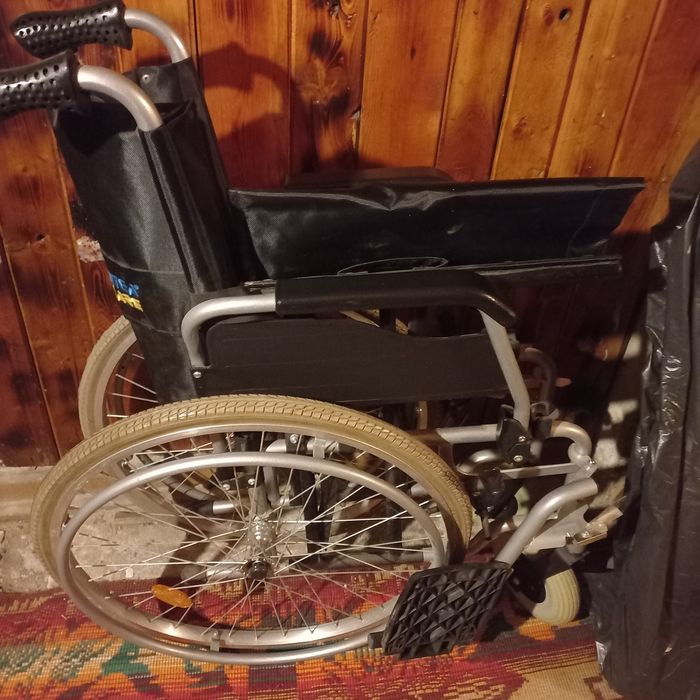 инвалидна количка.