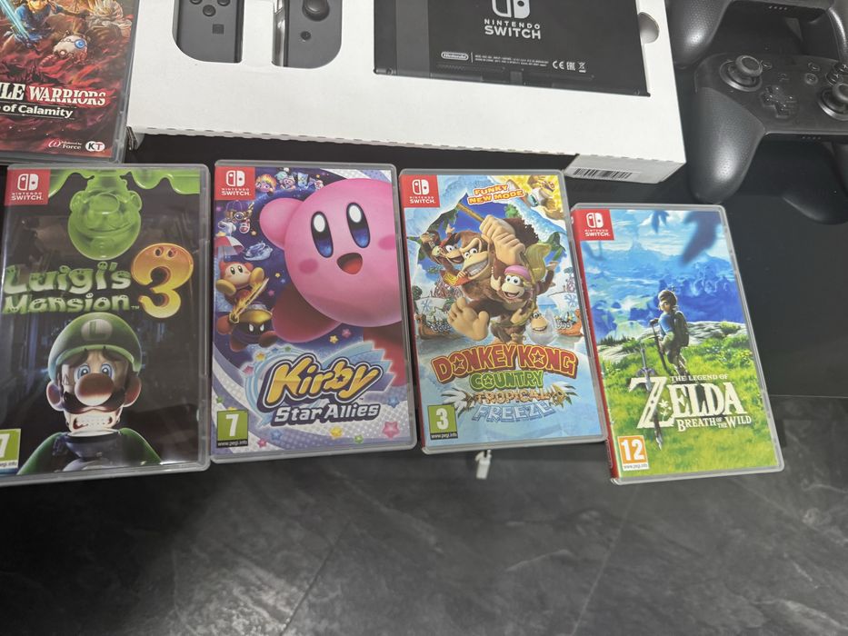 Pachet nintendo switch + 9 jocuri + 2 controlere in stare excelenta