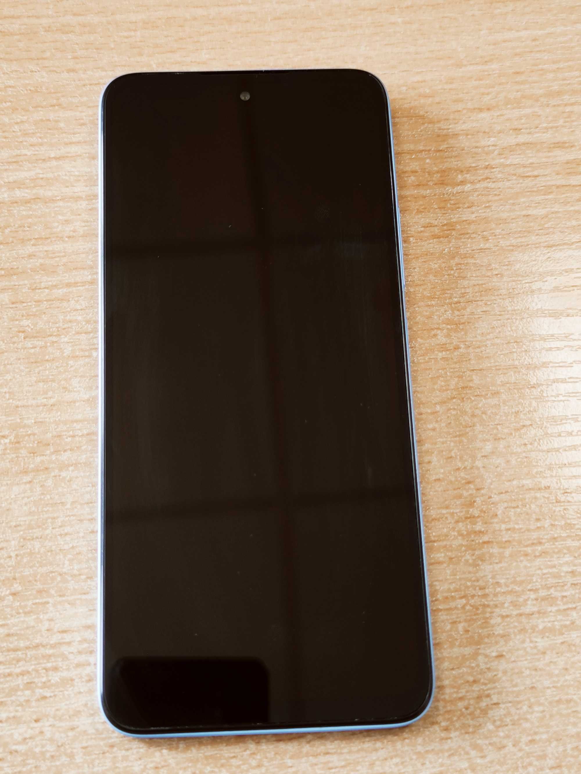 Xiaomi Redmi 12 .