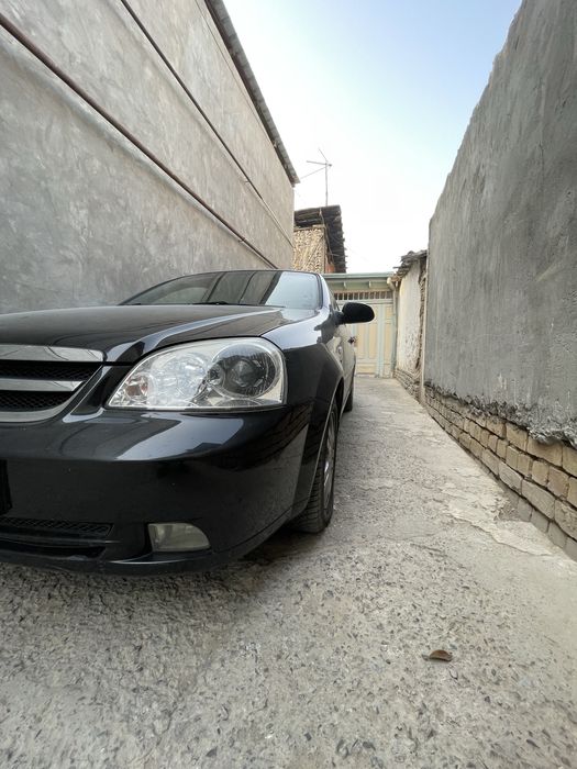 Lacetti 1.8 2010 yil qora 157.000 probeg