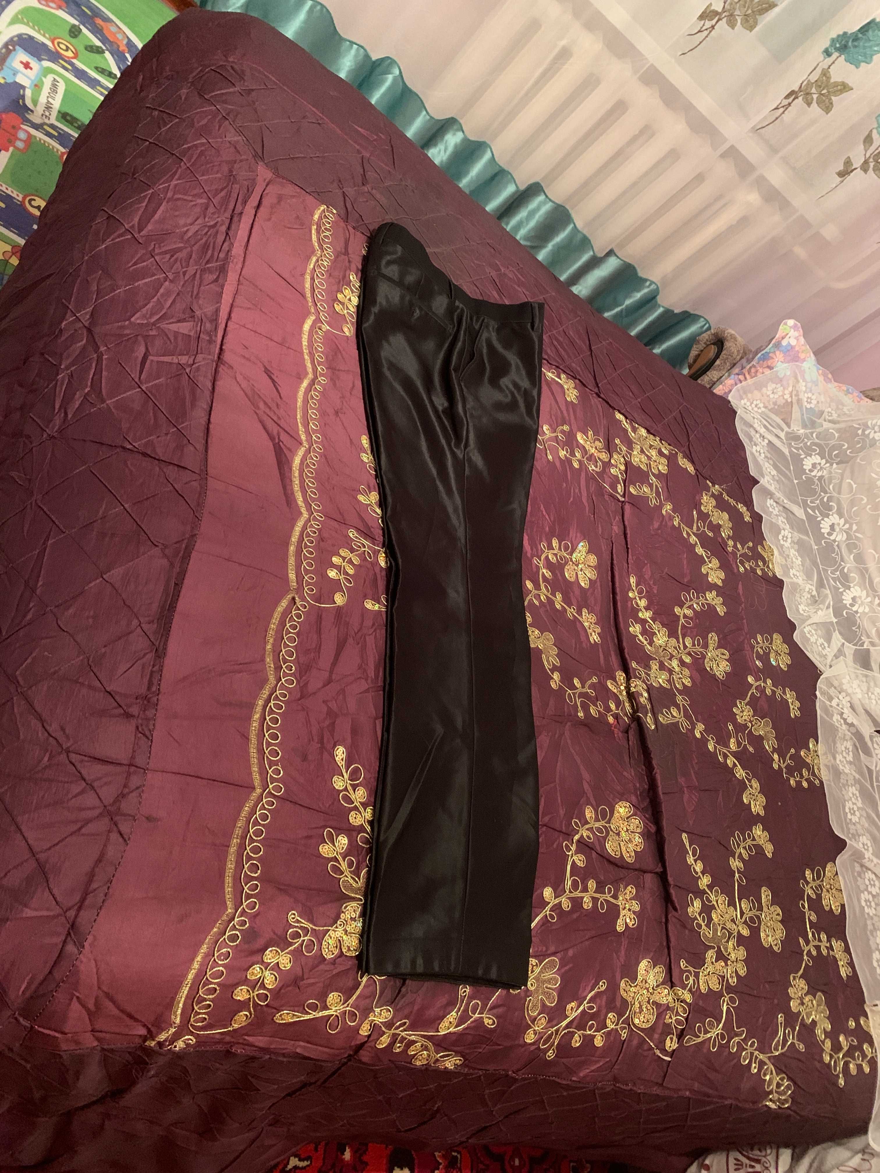 Продам костюм мужской из полиэстера черного цвета (сделано в Турции)