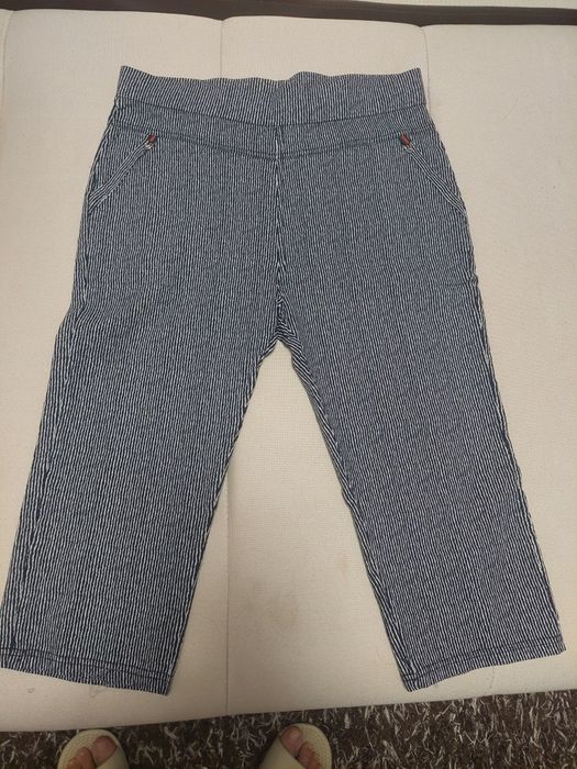 Pantaloni trei sferturi