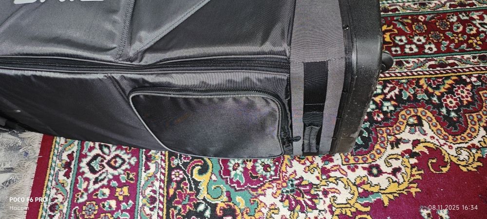 Сумка-кофр. На колёсиках. Для перевозки оборудования, удочек,клюшек