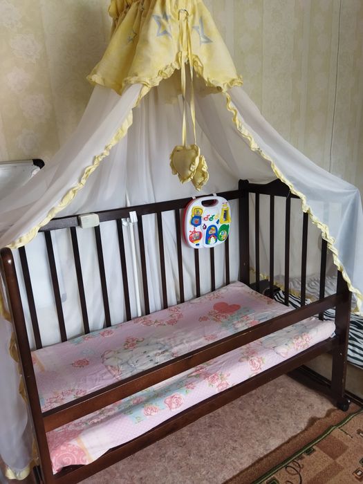 Продам кроватку детскую "НАША МАМА" с матрасом