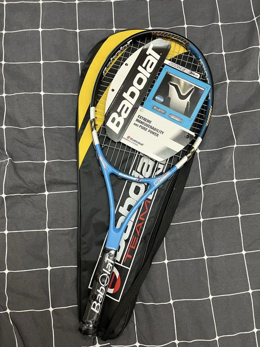 Теннисная ракетка