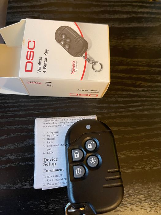 Telecomanda sistem alarma cu 4 butoane DSC seria Neo.