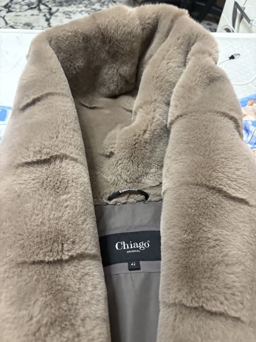 Продаю женский пуховик