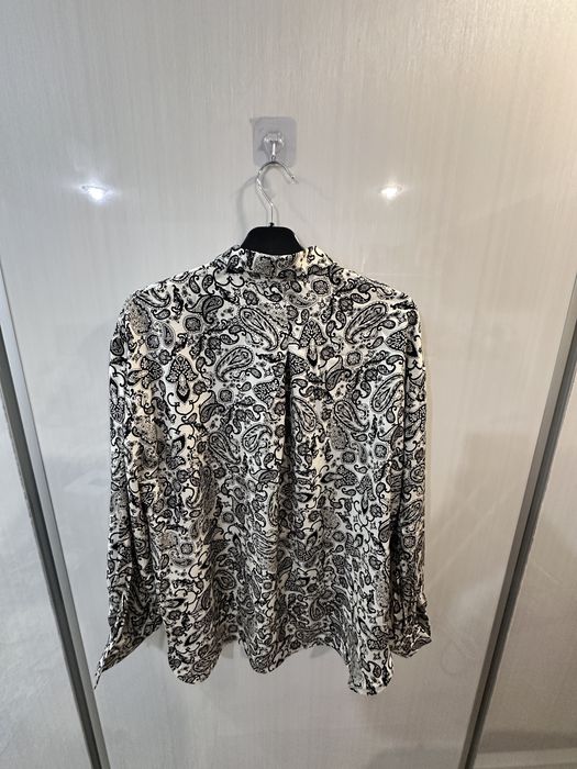 Cămașa elegantă eterna nouă