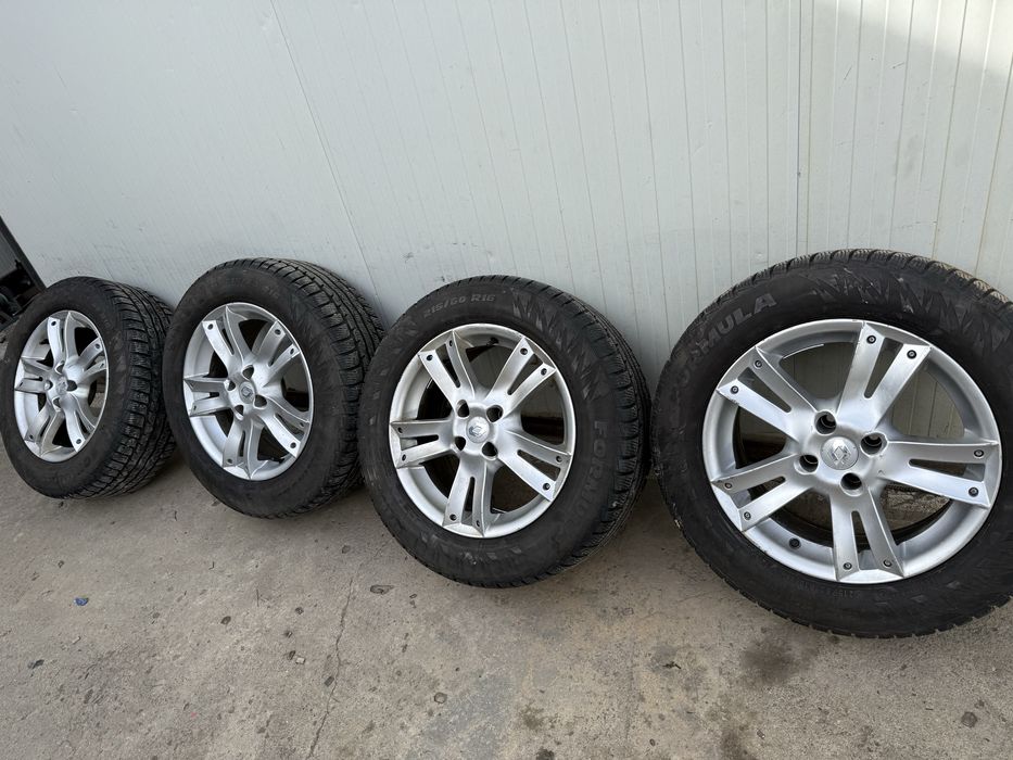 Vand set jante aliaj dacia 4x100 r 16 plus cauciucuri de iarna