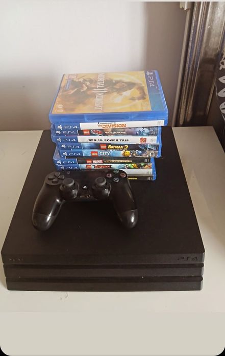 Playstation 4  Pro-1Tb plus jocuri