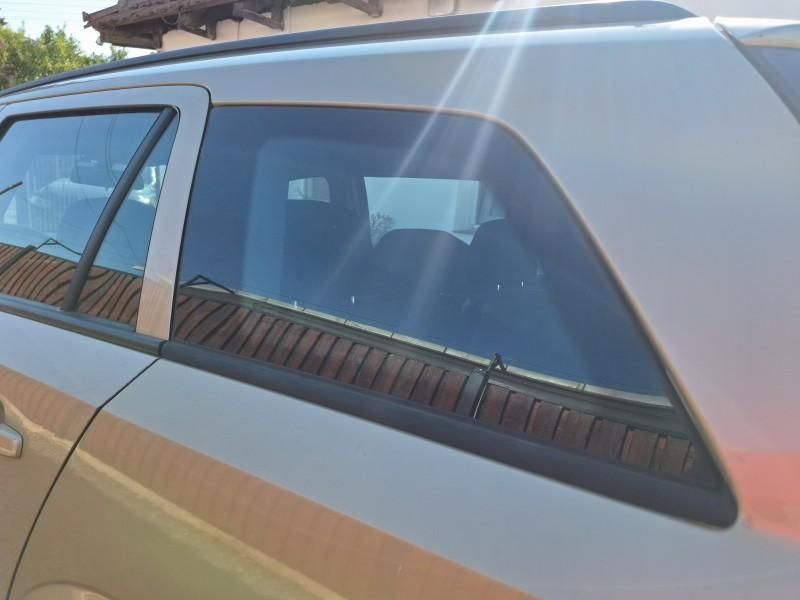 Geam fix aripa stanga spate Opel Astra H