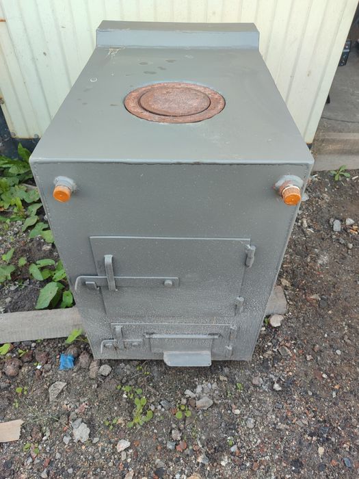 Котел отопления на твердом топлеве