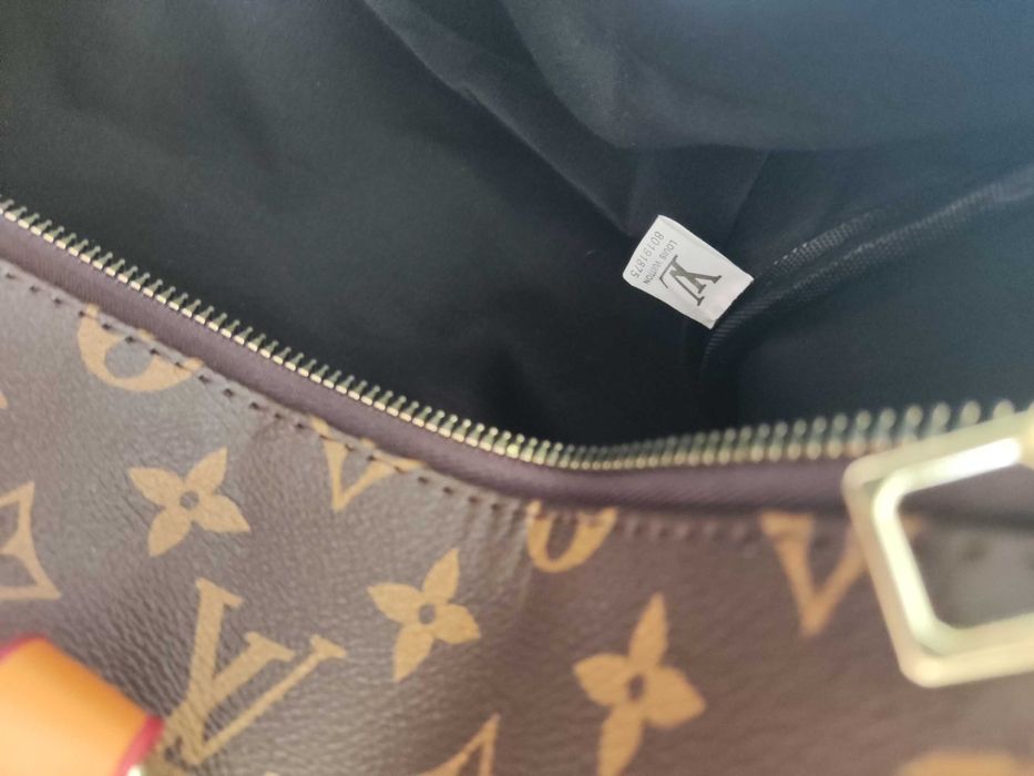 In stoc voiaj, geanta sport piele Louis Vuitton 1109.11
