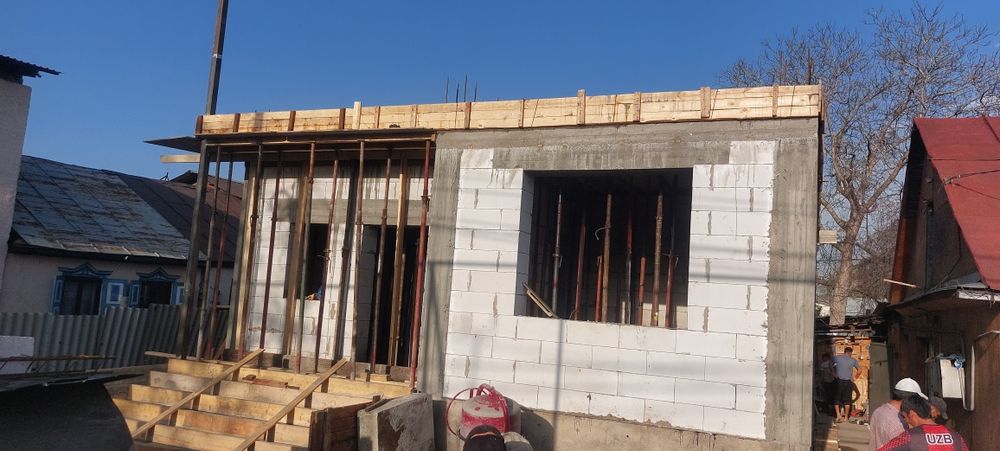 Строительство.  Бригада строителей из Узбекистан