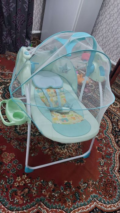 Срочно продам детские электронный шезлонг.