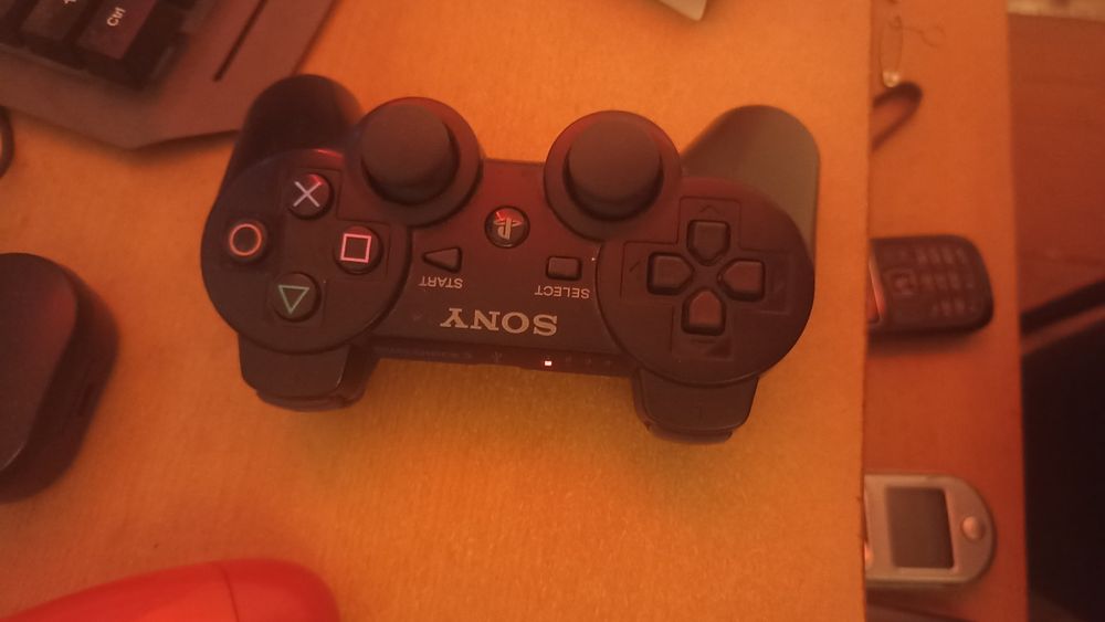 PS3 slim с 2 игри