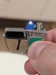 Bricheta de colectie breloc tip pistol benzina