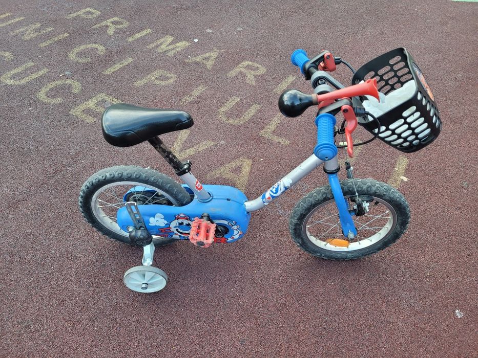 Vând bicicleta btwin cu rotile pe 14