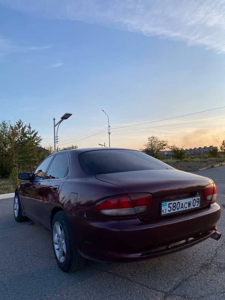 Машина Mazda xedos6