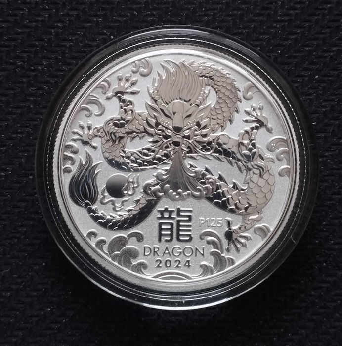 Серебряные монеты 1893 и 2022 гг.