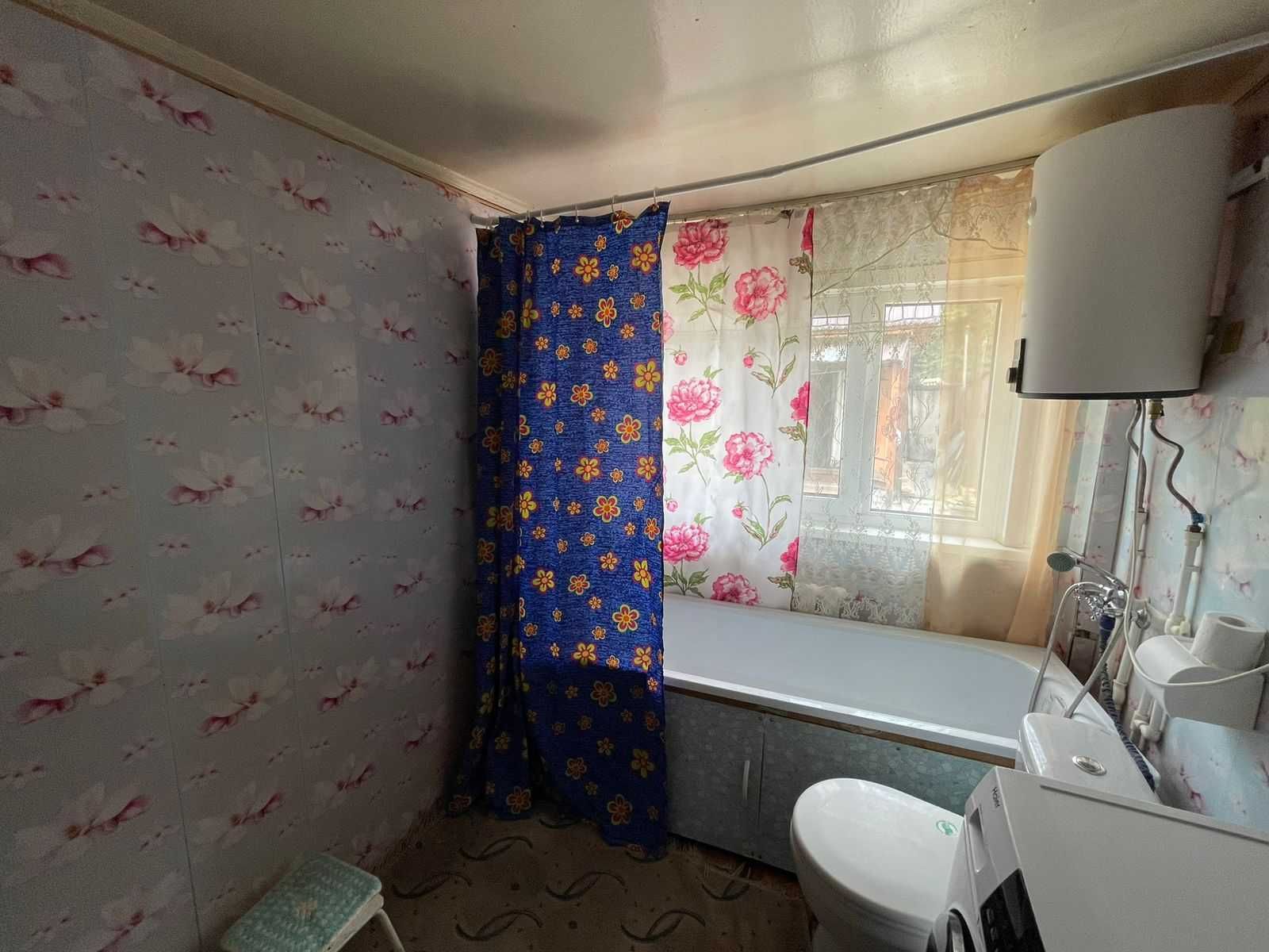 В продаже дом на четверых хозяев в районе Береке