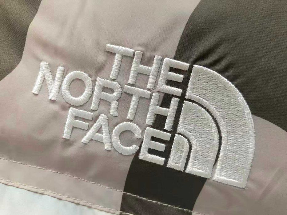 Geaca The North Face KAWS noua