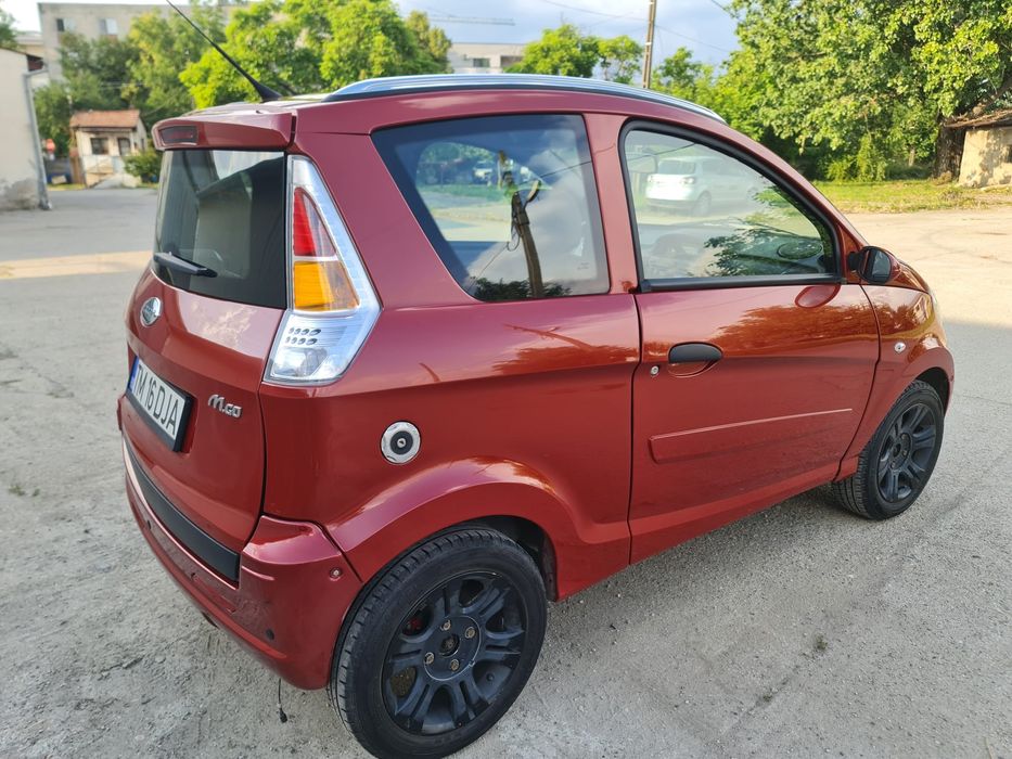 Vand MICROCAR M.GO family basic 4 PL,benzina 4 Locuri 21 CP
