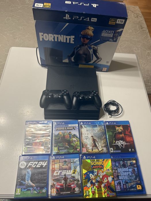 Ps 4 Pro 4K HDR 1 TB PlayStation cu 8 jocuri