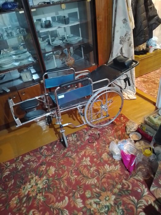 Инвалидная коляска.
