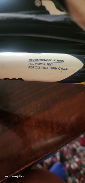 Теннисная ракетка