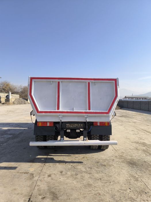 Ман,,самосвал...