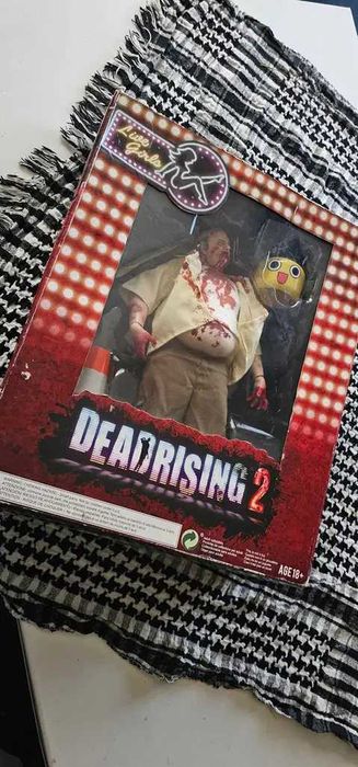 Figurina papusa din jocul dead rising 2