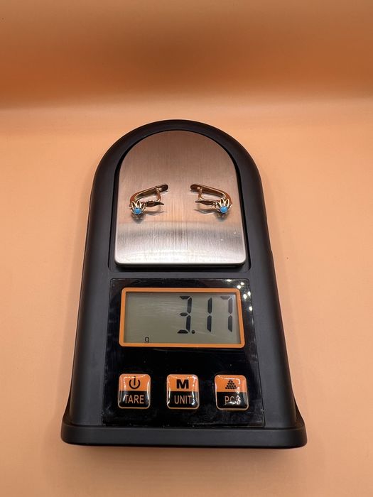 Продам золотые серьги.