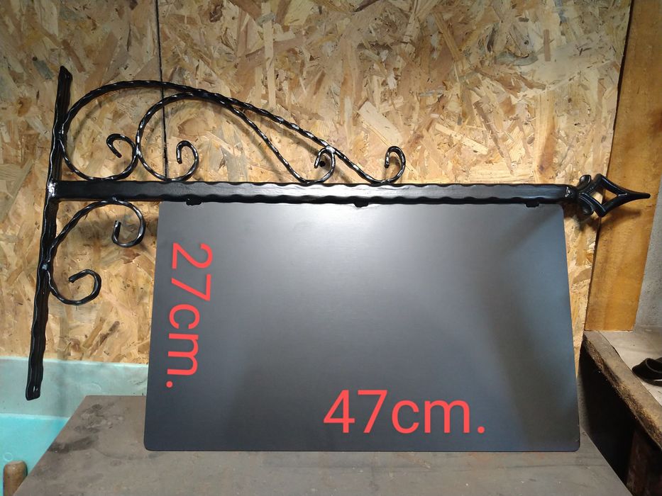 Рекламна табела от ковано желязо