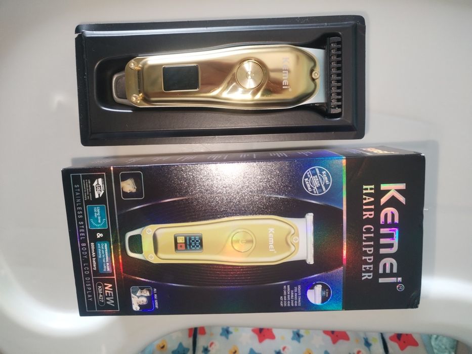 Masina de tuns Kemei