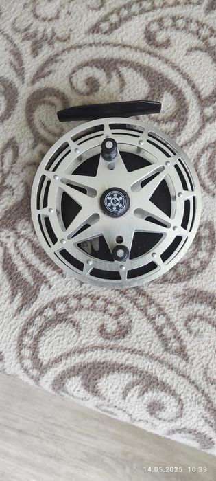 Катушка рыболовная.