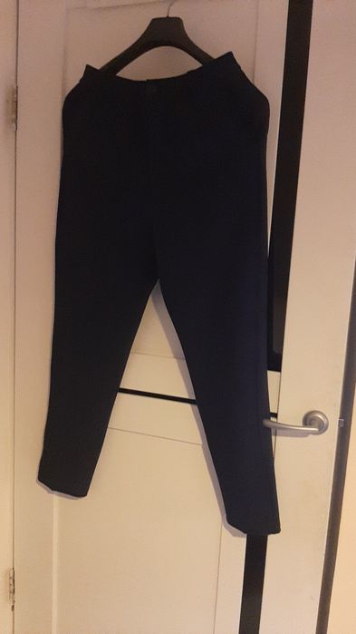 Продам новые темно-синие  брюки