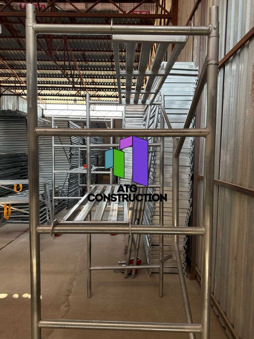 Строительные леса складные оцинкованные комплект с настилом и колесами