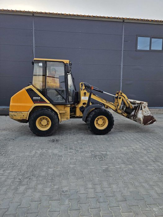 Caterpillar 906 - Incarcator Frontal