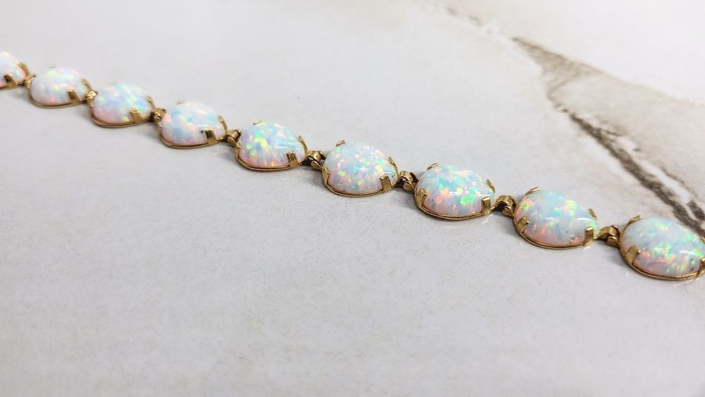 Brățară din aur de 14K cu Opal gramaj 7,02 gr