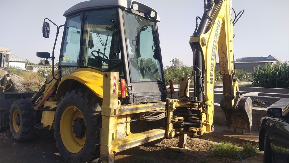 Hew Holland B90B экскаватор погрузчик Голландия 2011год