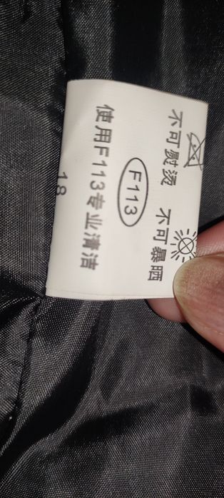 Дамски пухен елек с качулка