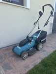 Vand masina de tuns gazonul Makita ELM3320