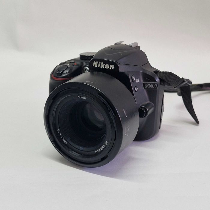 Liquid Money vinde - Aparat foto Nikon D3400 + 2 obiective, 3 filtre