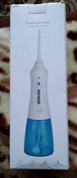 irigator bucal portabil
