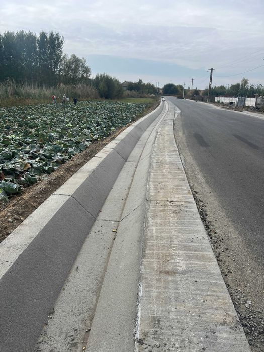 Santuri si rigole betonate  rigole de acostament realizate mecanizat