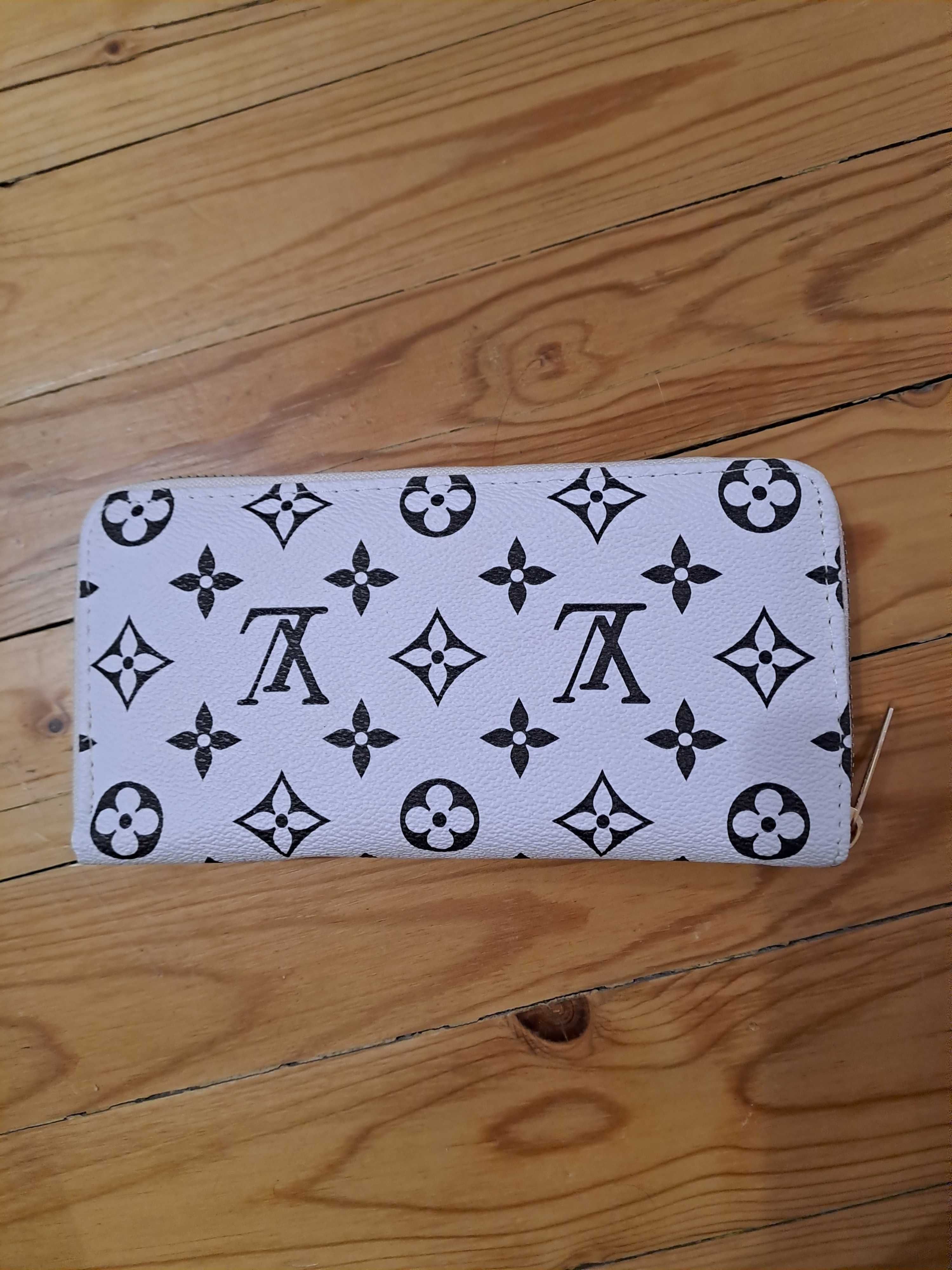 Портмонета на ''Louis Vuitton''