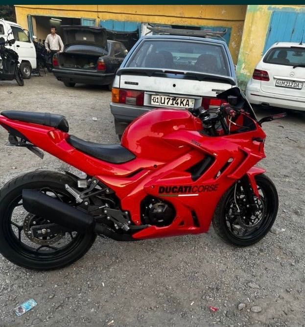 Мотоцикл дукати 400 тали