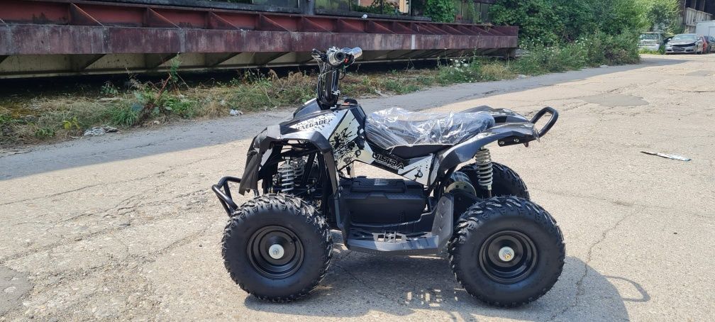 ATV 1000w nou cu garanție pentru copii cu viteza reglabila 
Frane pe d
