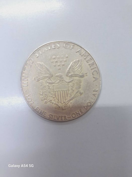 Монета долар 1900